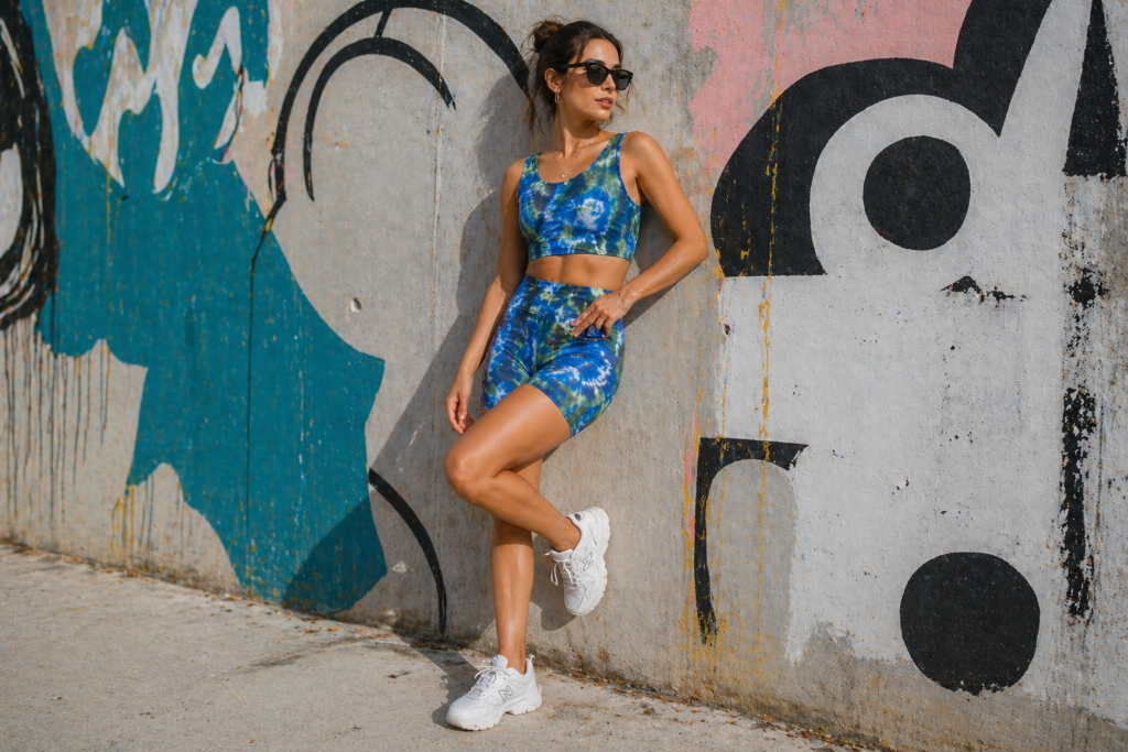 summer outfits for women - matching tie-dye crop top and shorts athleisure street style