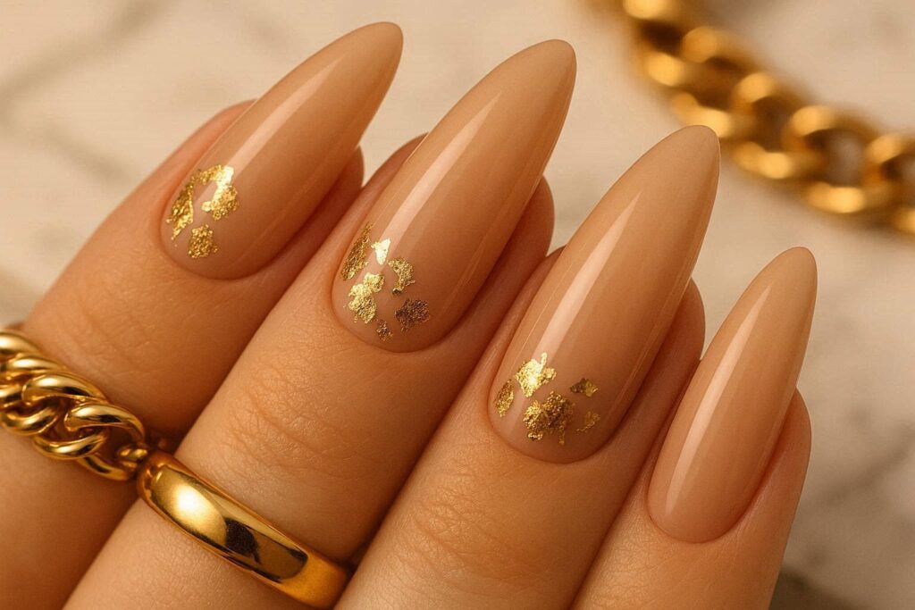 Nude gold foil summer nail design 2026 long almond nails minimalist luxe summer nail color