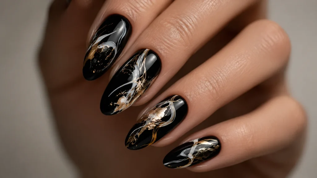  black abstract nail art ideas with white gold brushstroke design editorial 2026