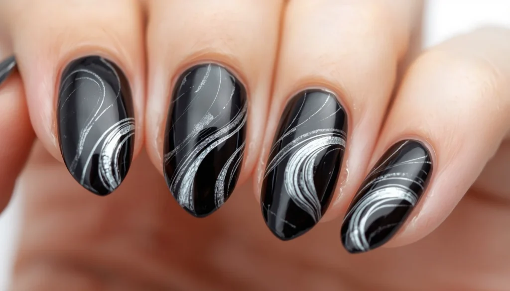  black marble nail ideas with white veining on almond nails luxury look